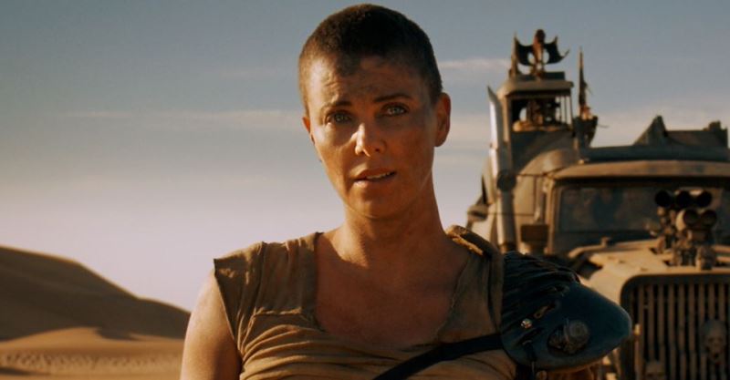 Charlize Theron As Furiosa With Truck In Mad Max Fury Road